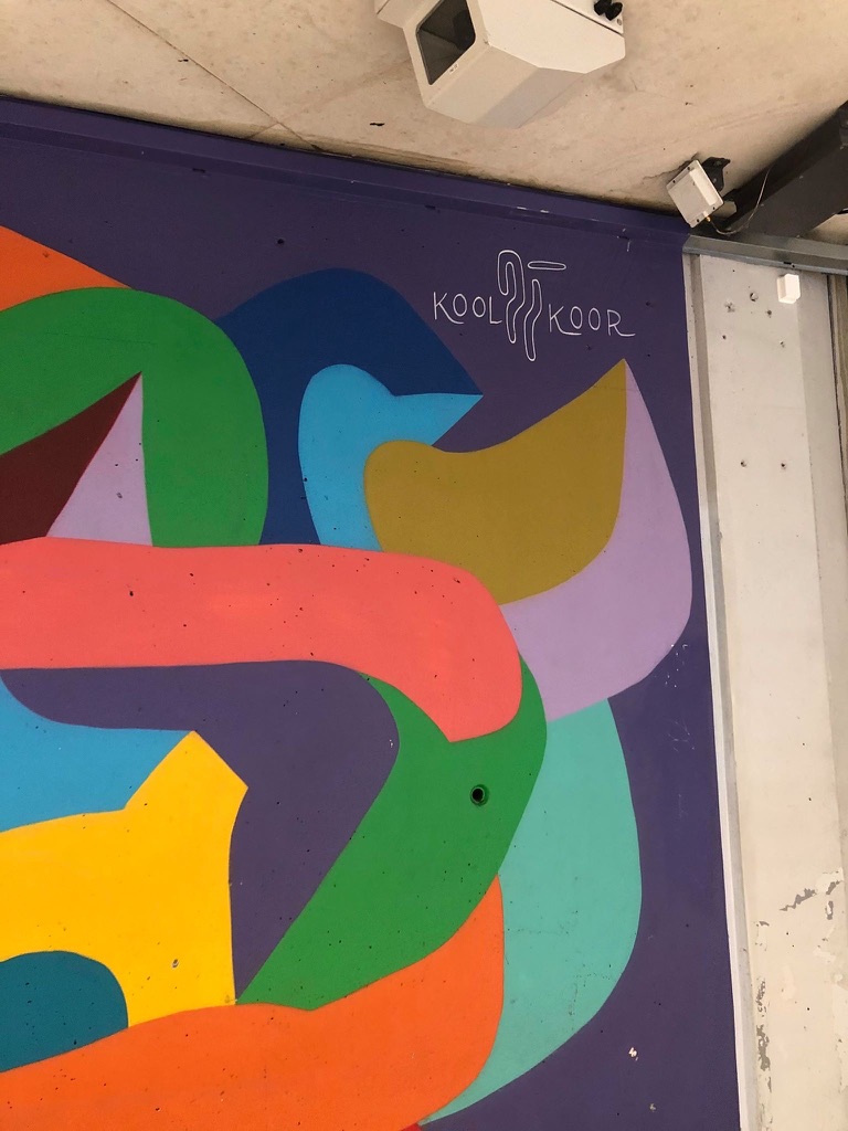 Signed detail at the end of the 35 metre Gare du Nord mural