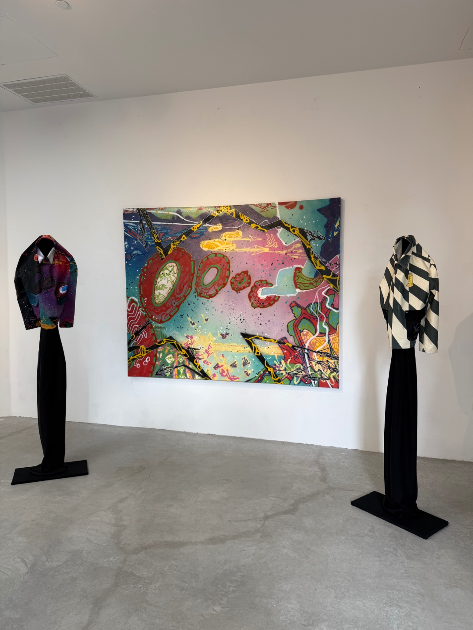 Garments and painting installed at SHIN Gallery