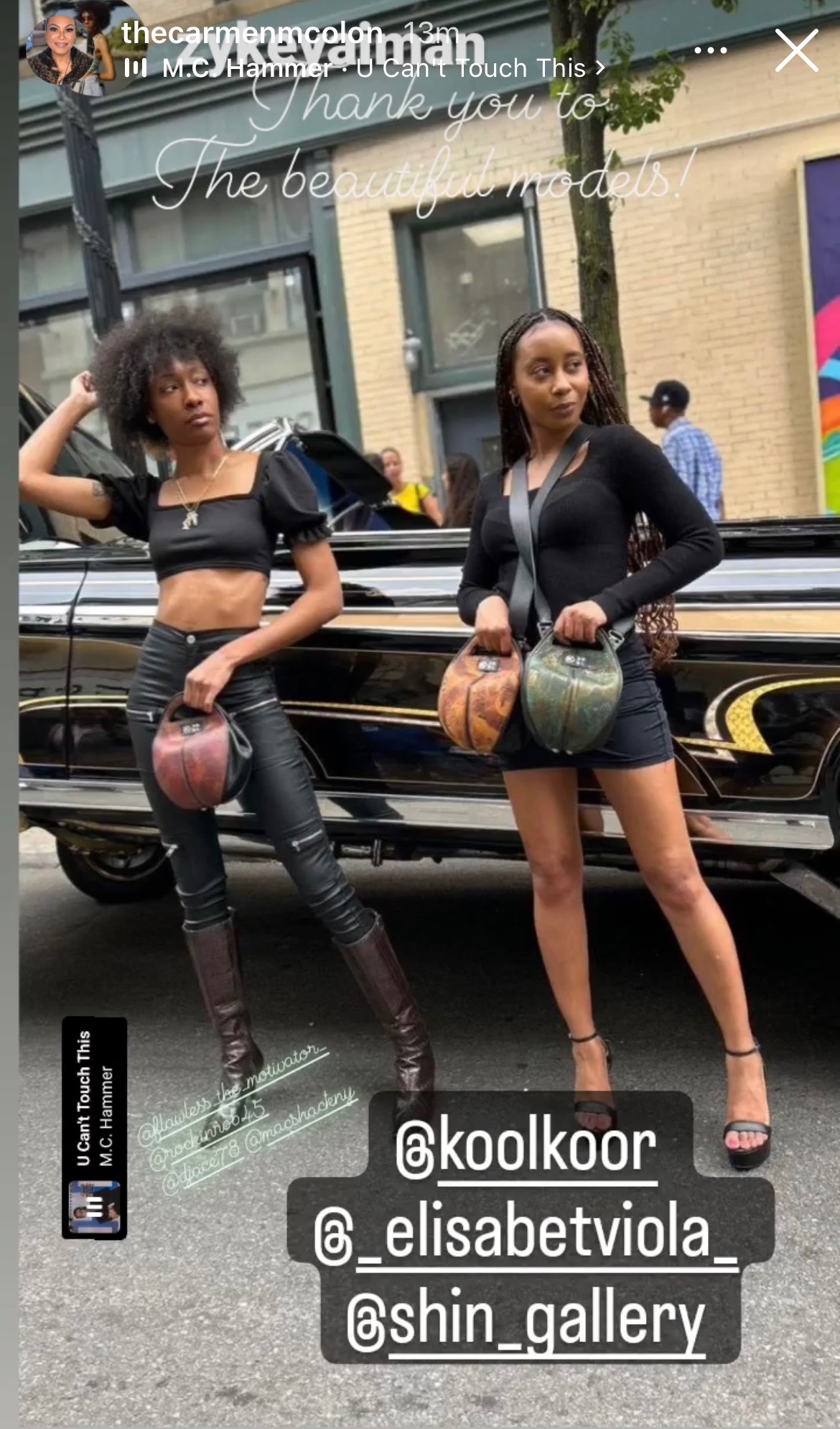 Models carrying basketball handbags during the opening