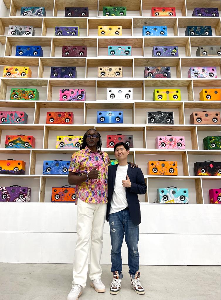 KOOL KOOR with Hong Gyu Shin in front of the KK MEGABOOM installation at SHIN Gallery, New York, 2023